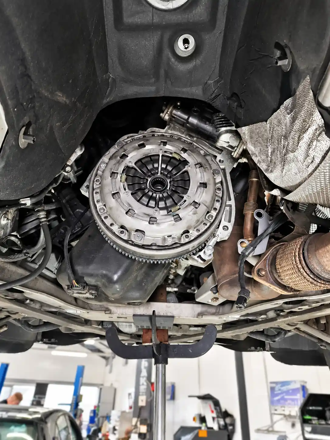 Clutch and flywheel removed during a clutch replacement