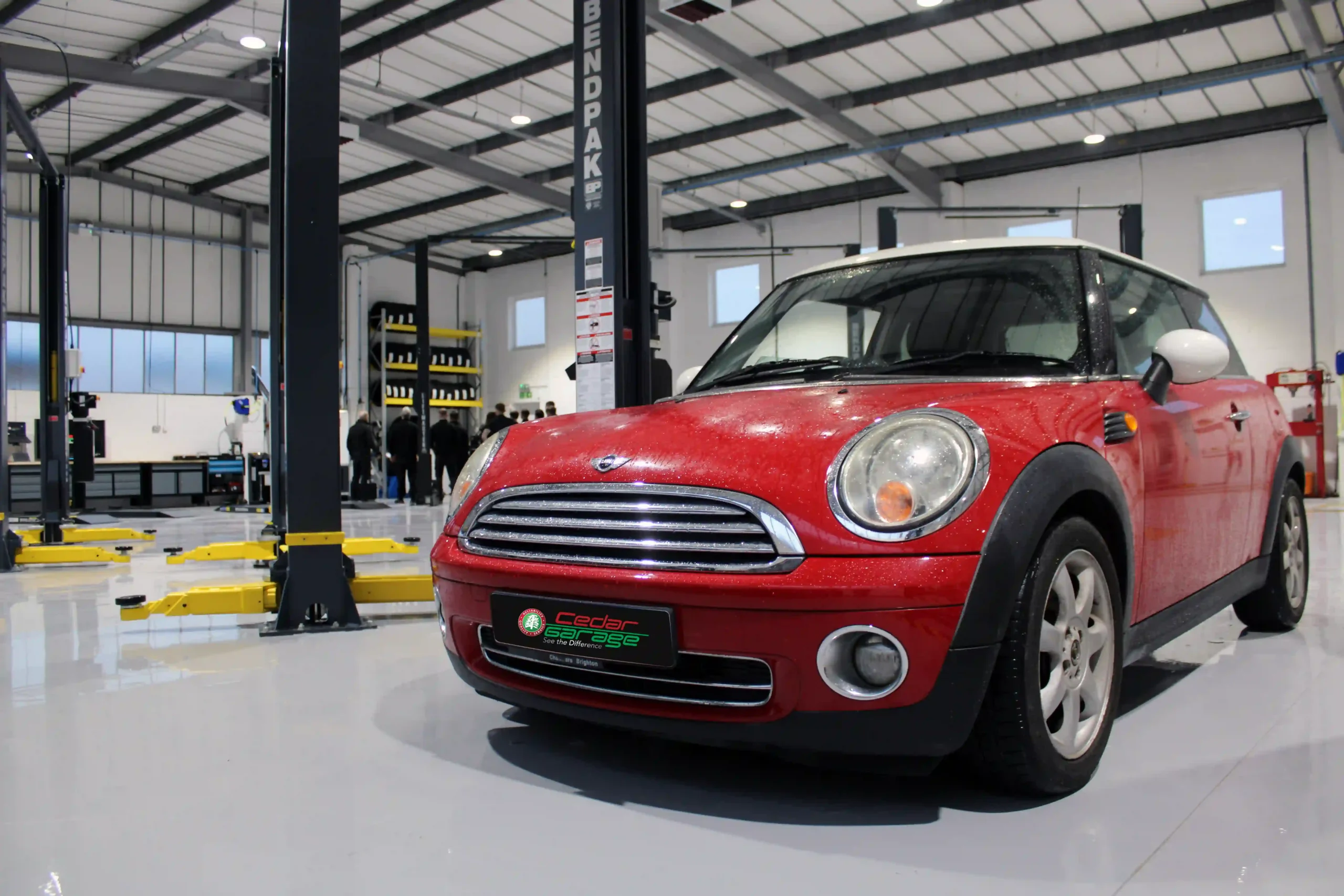 Red Mini Cooper in the Cedar Garage workshop in Sompting