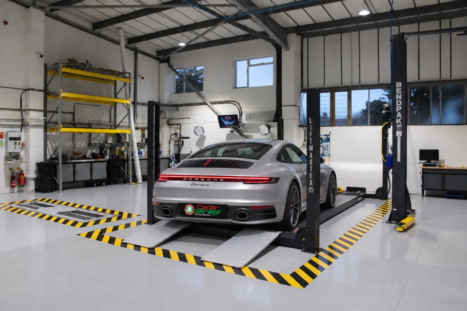 Car on the MOT ramp at Cedar Garage