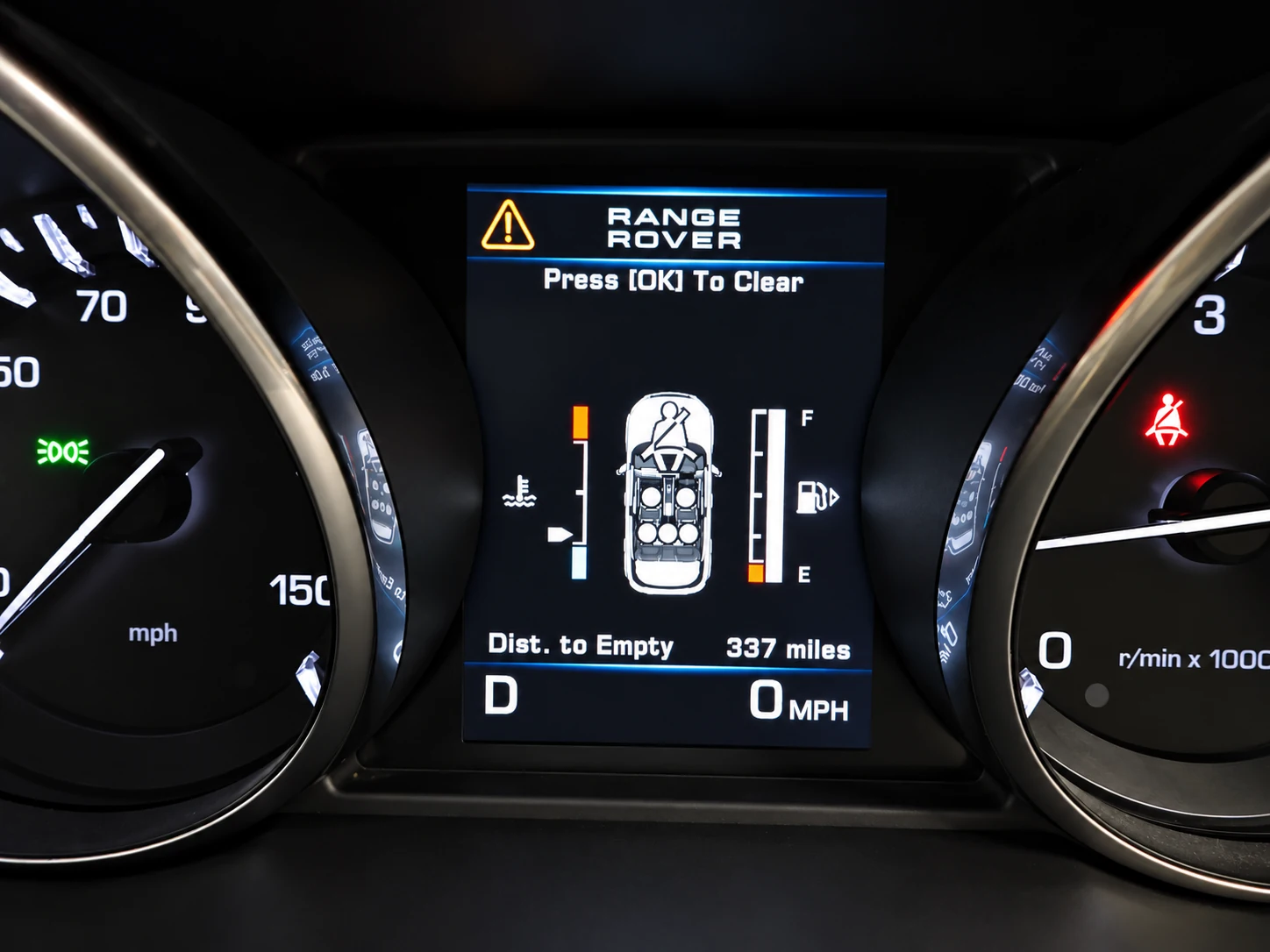 Range Rover dashboard showing a warning message