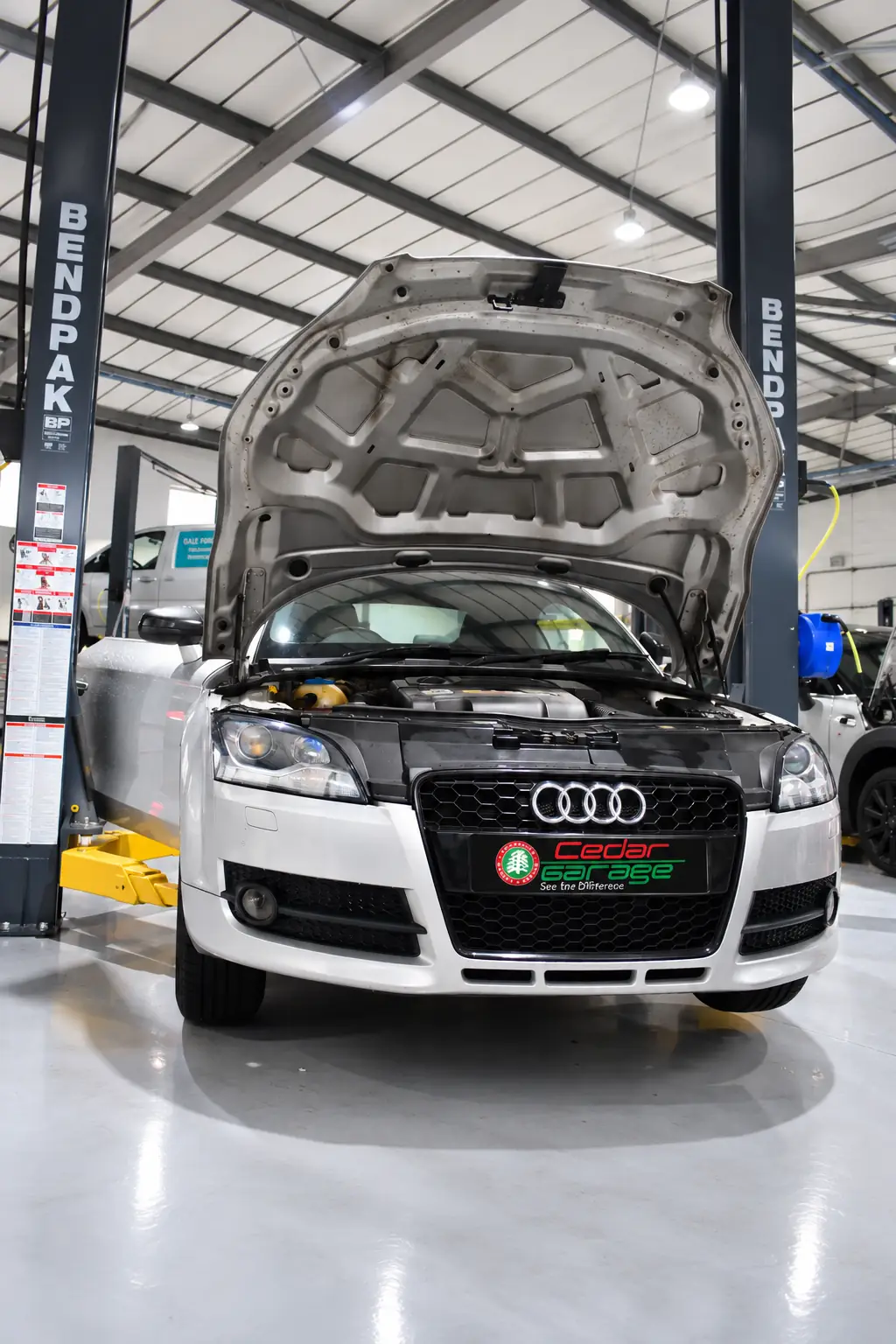 Audi TT on a ramp in the Cedar Garage workshop in Sompting