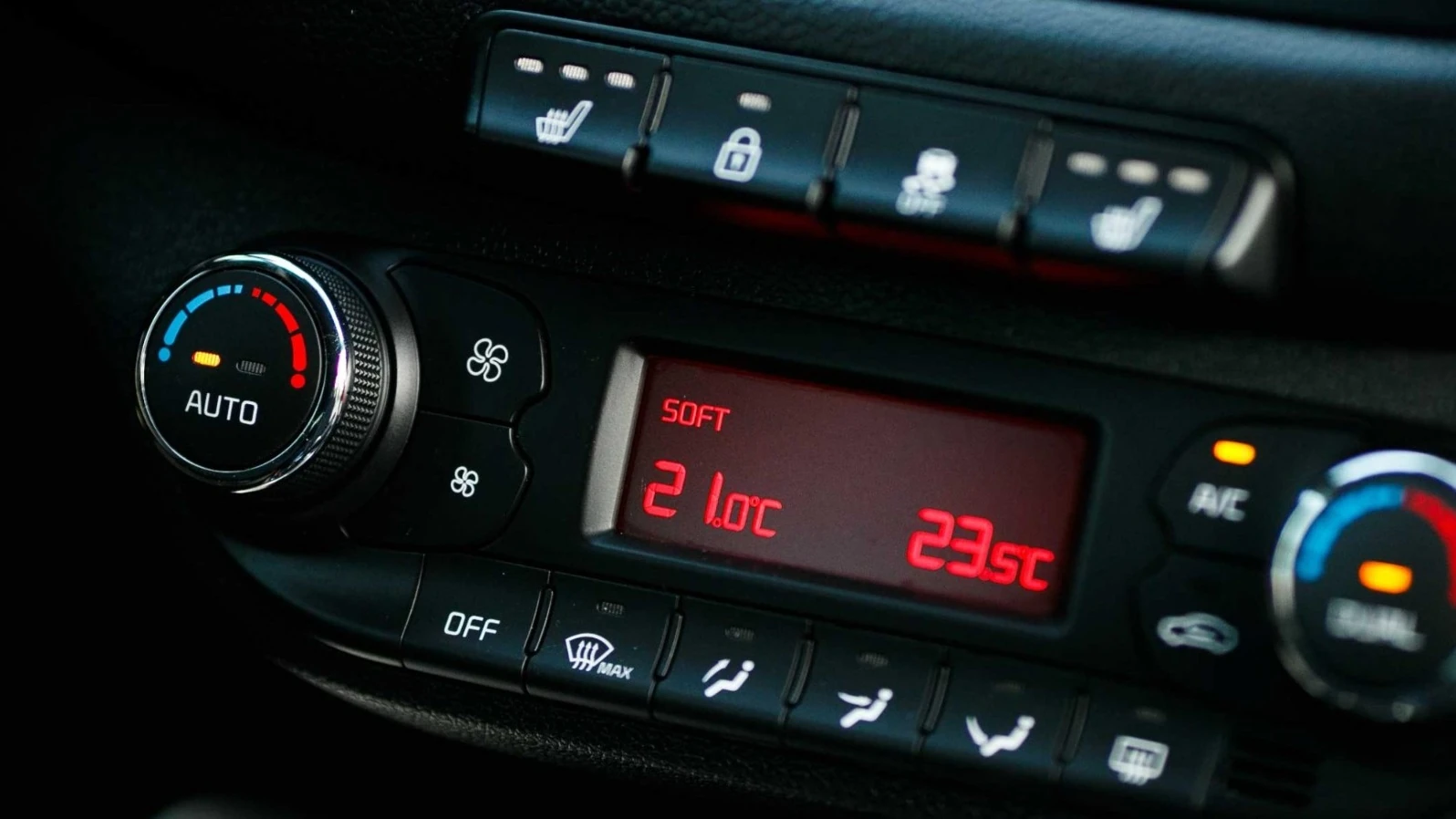 Car climate control panel showing air conditioning settings