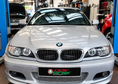 BMW 330 with ABS and traction control warning lights on, repaired at Cedar Garage