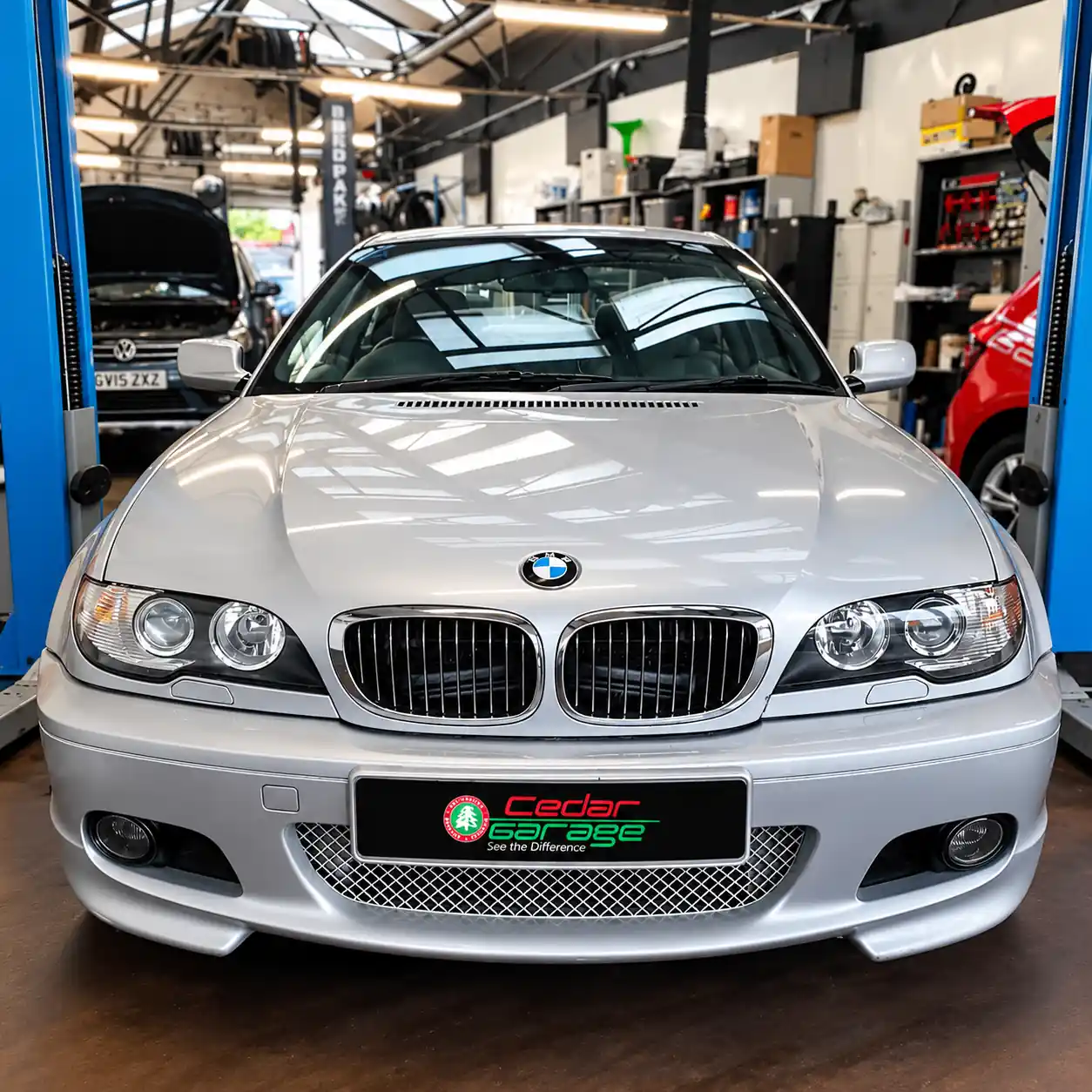 BMW 330 with ABS and traction control warning lights on, repaired at Cedar Garage