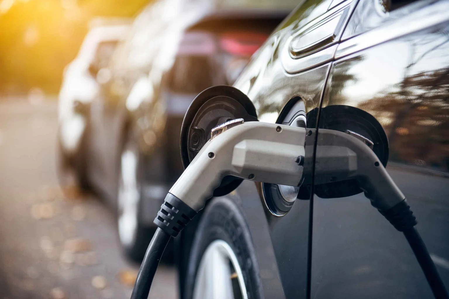 Electric car plugged in and charging