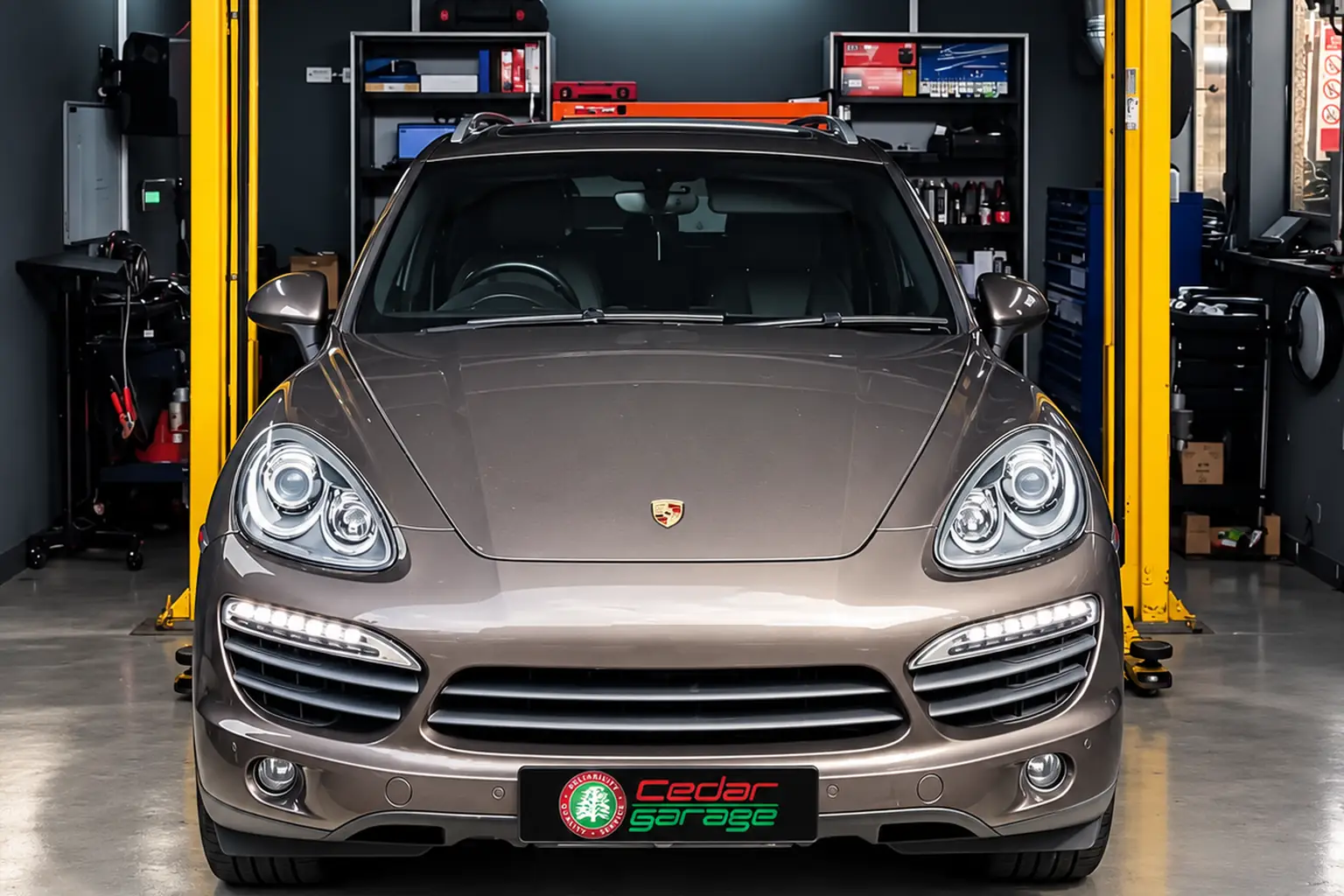 Technician carrying out a high-voltage repair on an electric car