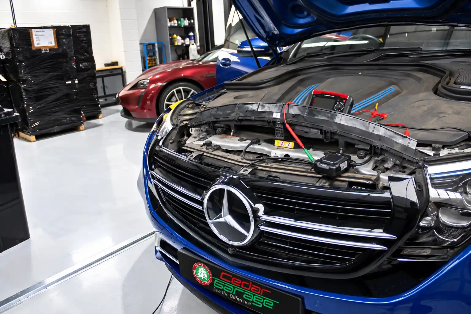 Mercedes engine bay at Cedar Garage during electrical fault testing
